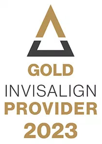 The image features a logo with the text  GOLD INVISALIGN PROVIDER 2023  alongside an emblem resembling a triangle with a golden border, set against a white background with a black border framing the entire design.